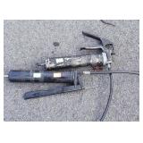 Two grease guns