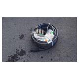 Roll of 100 foot garden hose