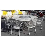 Round glass top patio table with eight chairs,