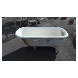 Claw footed cast iron bath tub, is in good shape