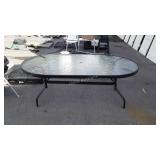 Glass top patio table