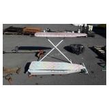 Four metal ironing boards