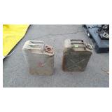 Two metal fuel cans