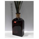 Brown bottle vase with Artificial greenery