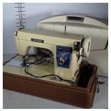 Vintage Dress Maker sewing machine with case.