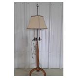 Tri-footed vintage lamp. One leg needs tightened