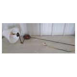 Wall sconce with cord cover and moving arm.