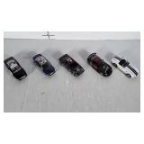 3 toy cars. 3 are police cars.