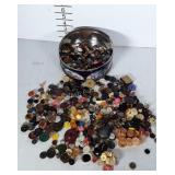 Cookie tin full of misc. buttons.