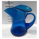Blown pinched glass pitcher