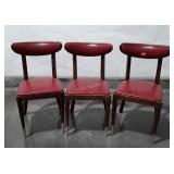 3 red padded chairs, wooden frame,  back needs