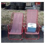 Two beach chairs and a playmate maxcold drink