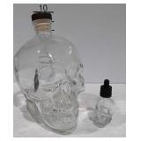 Two skull shaped Decanter Style bottles