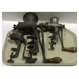 Three meat grinders