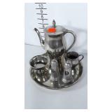 Metalware service pieces.  Pewter Tea pot, cream