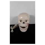 Skull shaped night light / table lamp. Glaze has