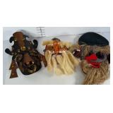 Tribal masks. One on far left is wall decor and