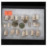 Dug relics: bullets and buttons.