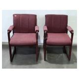 Two burgundy red waiting room chairs