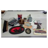 Push broom head, wall plaque, textiles, book,