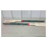 Two molded plastic raft oars, lightweight.