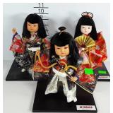 Japanese dolls on stands, fan, kite flying and