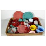 Play dishes, assorted colors and pieces. Ready