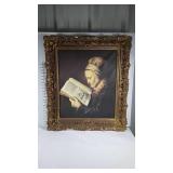 Canvas print of woman reading in large gold gilt