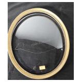 Older Oval frame with convex glass. Measures 15x18