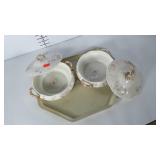 2 older serving dishes with lids. Gold finish in