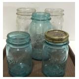 Tray of ball jars only one with lid