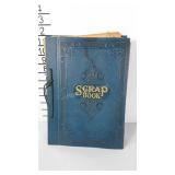 Old Scrap book filled with vintage postcards.