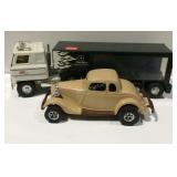 Toy tractor trailer and a toy plastic Ford