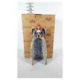 Jim Shore angel with hollow center. Comes with a