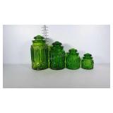 Green glass canisters in nice condition.
