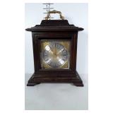 Wooden mantel clock with lovely gold toned