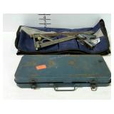 Tools. Two carpenter squares, bucket pouch