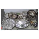Silver toned / plated service ware.