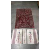 Two small rugs. One older with wear and one