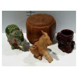 Four travel souvenirs representing multiple