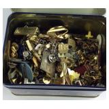 Tin with pins and clips