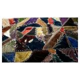 Early crazy quilt, wonderful embroidery along