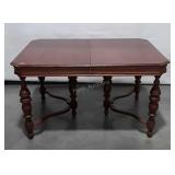 Walnut Dining Table. Double tri leg pedestal base