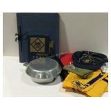 Cub Scout collectibles- hat and scarf, books, and