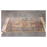 Shorter runner rug/area rug. Needs cleaning.