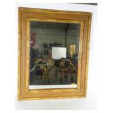 Mirror with molded plastic, bamboo style frame.