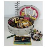 Sewing notions in basket tin