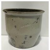 Stoneware crock has chips and hole in bottom