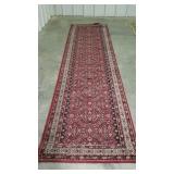 Runner rug in nice deep red. 3