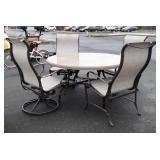 Round tropitone patio table with four chairs,